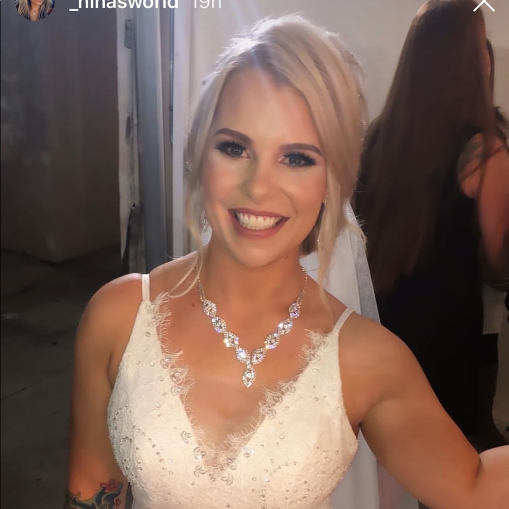 Wedding dress, veil, and underneath slip